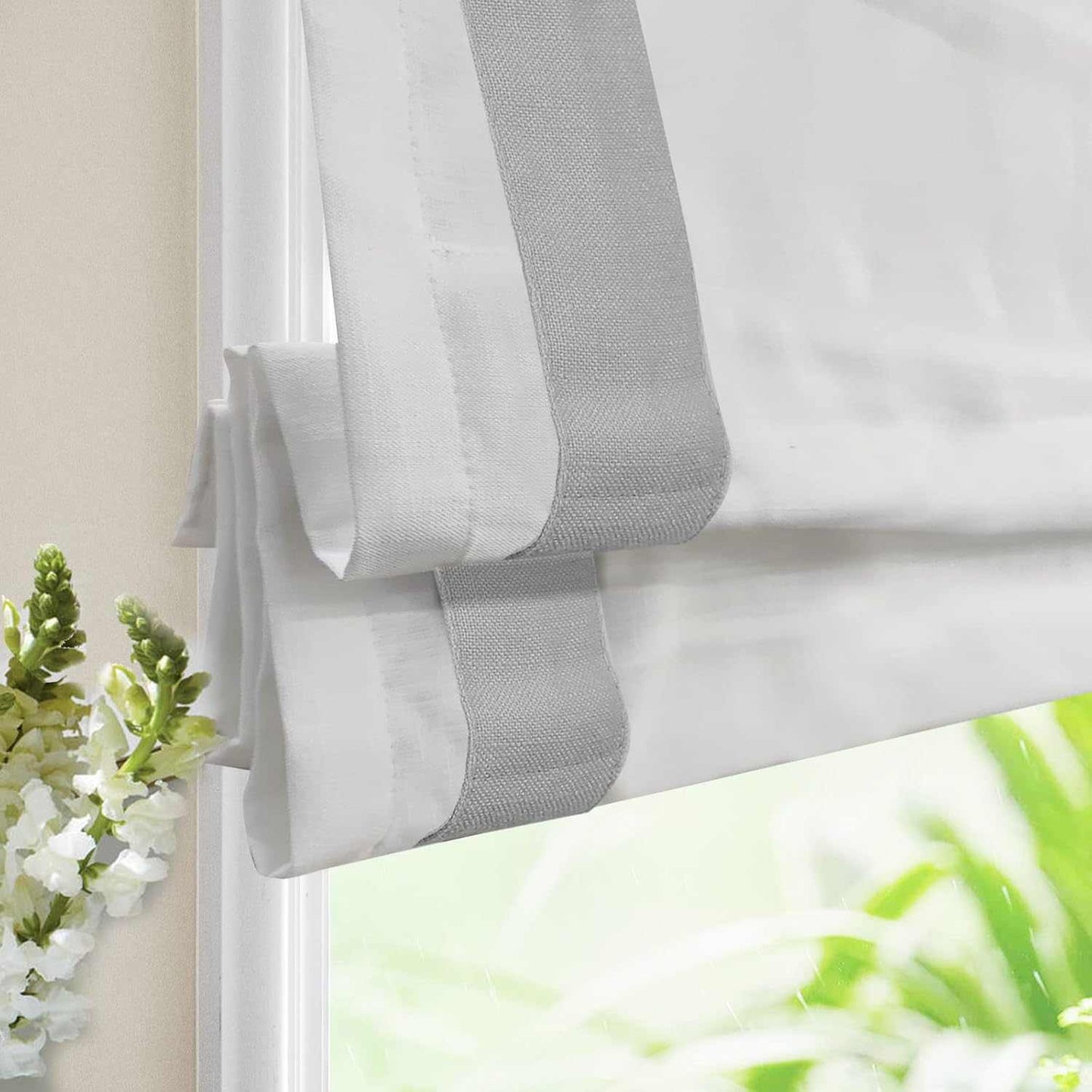 No-drill blackout Roman shade with white fabric lining, cordless lift, and custom sizing, easy to install without tools