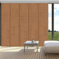 Blackout sliding panel blinds covering large sliding glass doors with modern track system