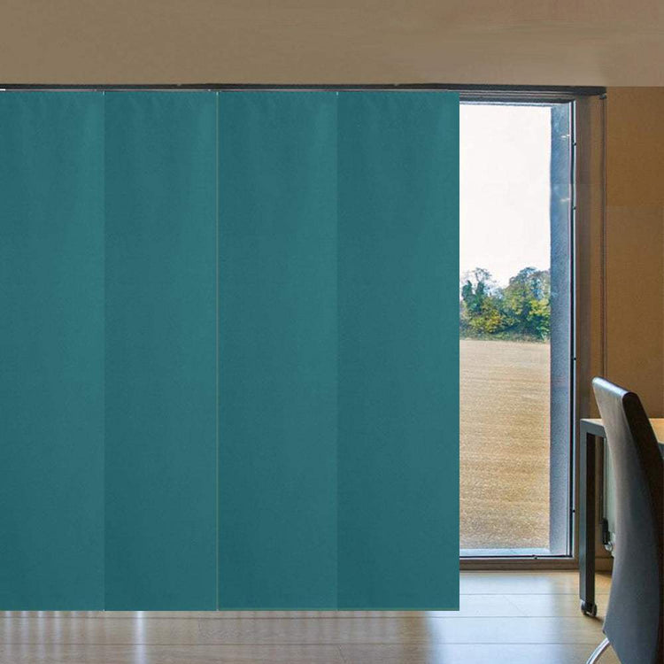 Blackout sliding panel blinds covering large windows and sliding glass doors for privacy and light control