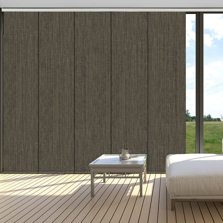 Cordless blackout sliding panel blinds on large windows with modern vertical design