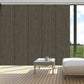 Cordless blackout sliding panel blinds on large windows with modern vertical design