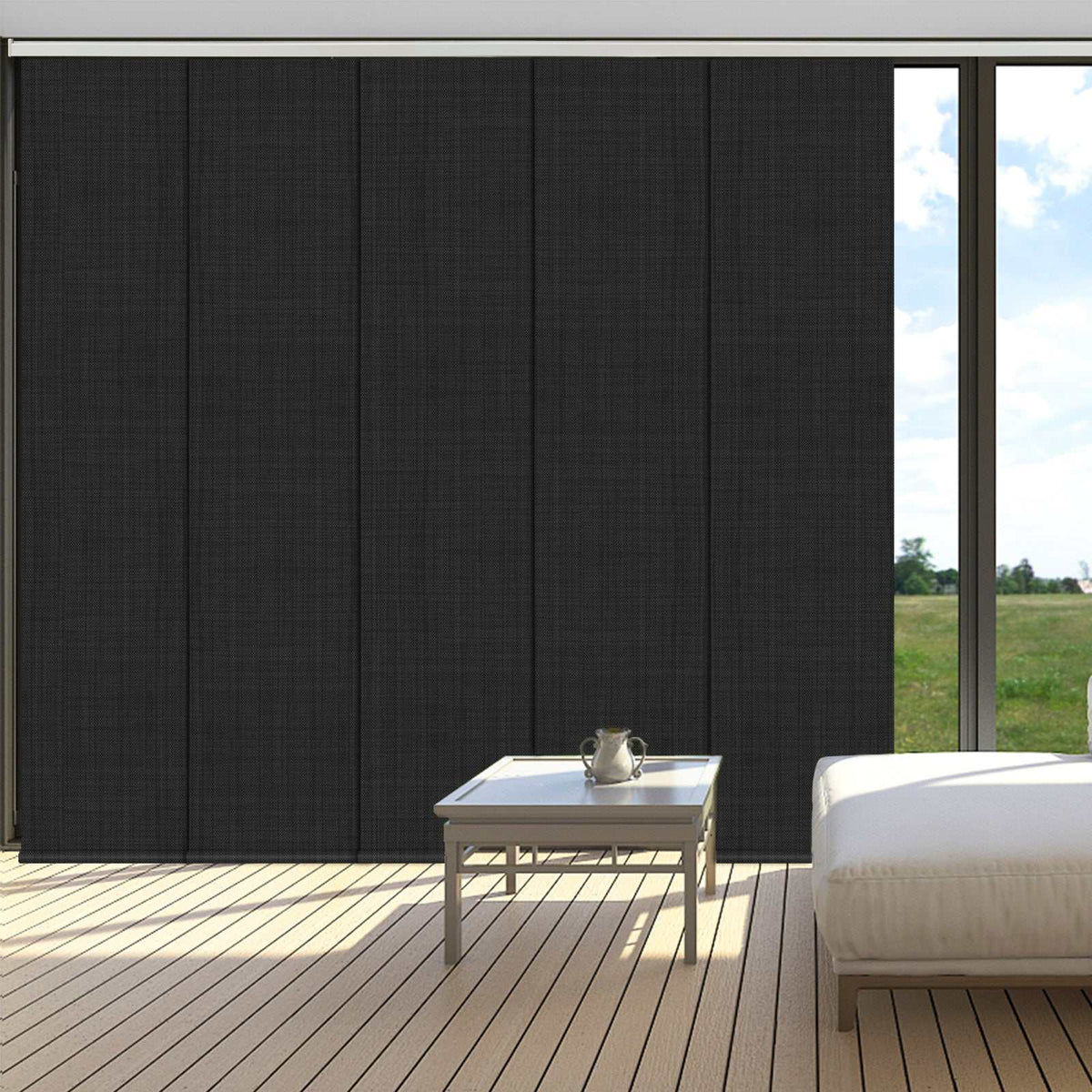 Blackout sliding panel blinds covering large sliding glass door with modern track system for privacy and light control