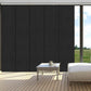Blackout sliding panel blinds covering large sliding glass door with modern track system for privacy and light control