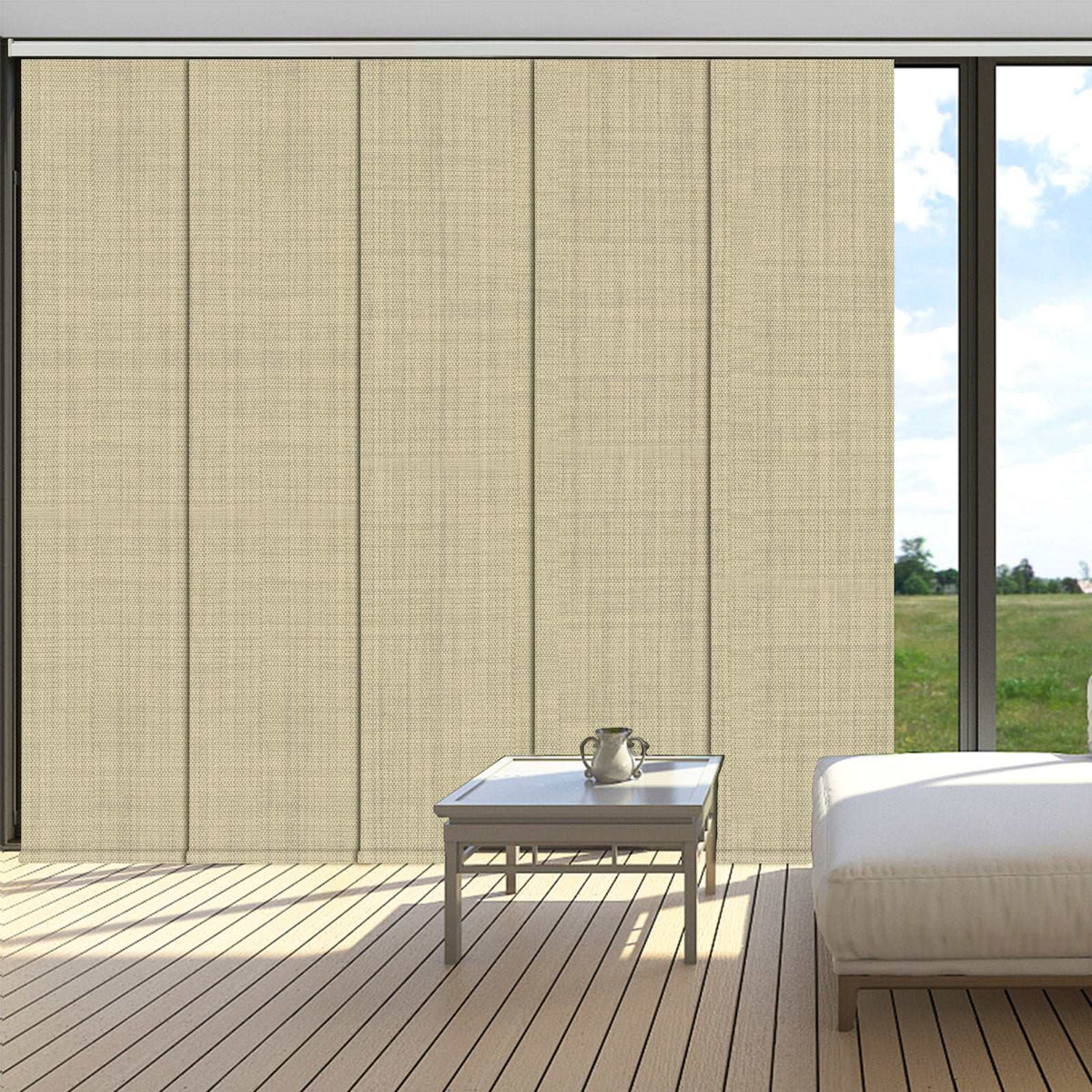 Blackout sliding panel blinds covering large sliding glass doors in a modern room