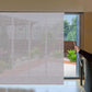 LANTIME waterproof sliding panel blinds installed on large window with solar light filtering