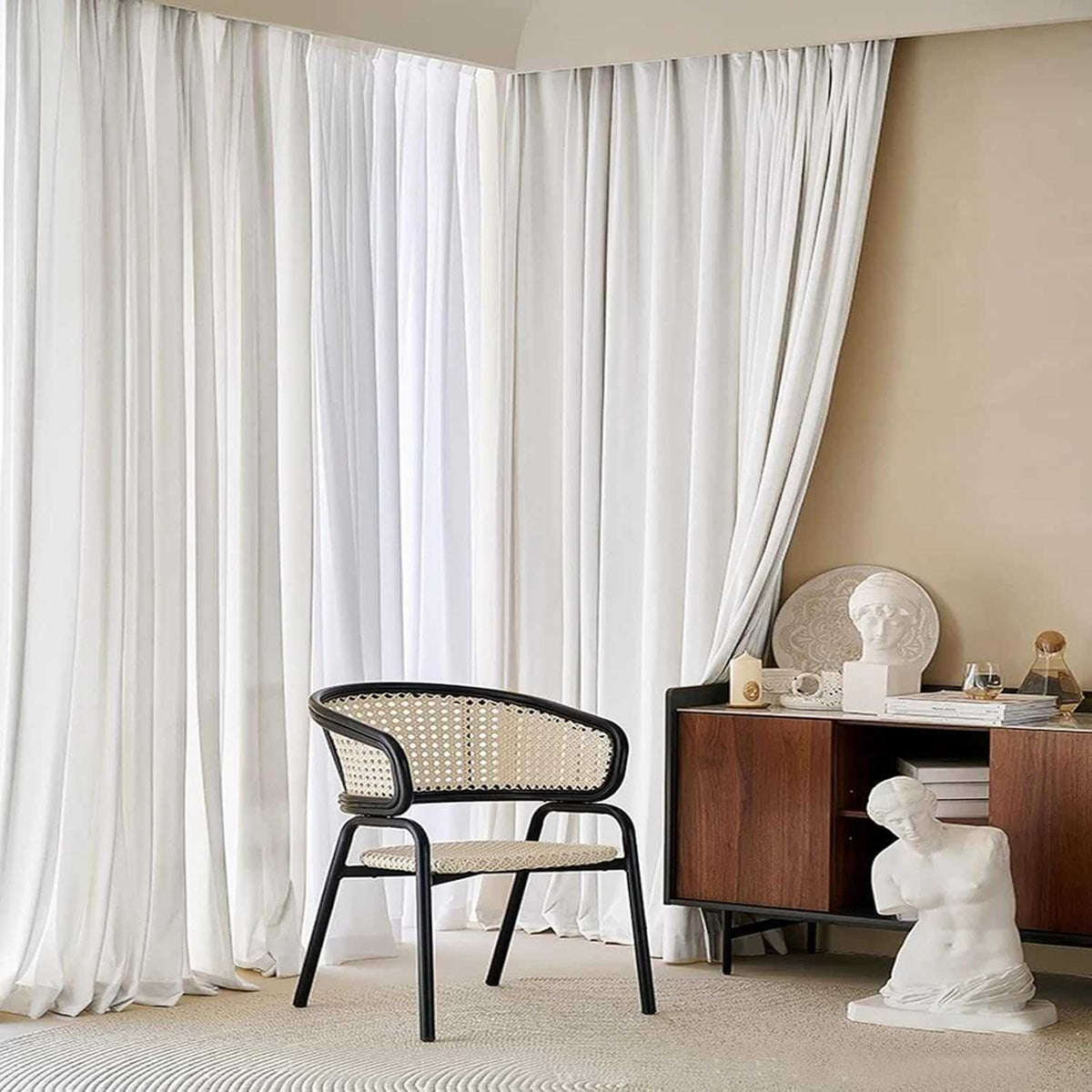 Pair of LANTIME velvet room darkening curtains with pinch pleats hanging on a window