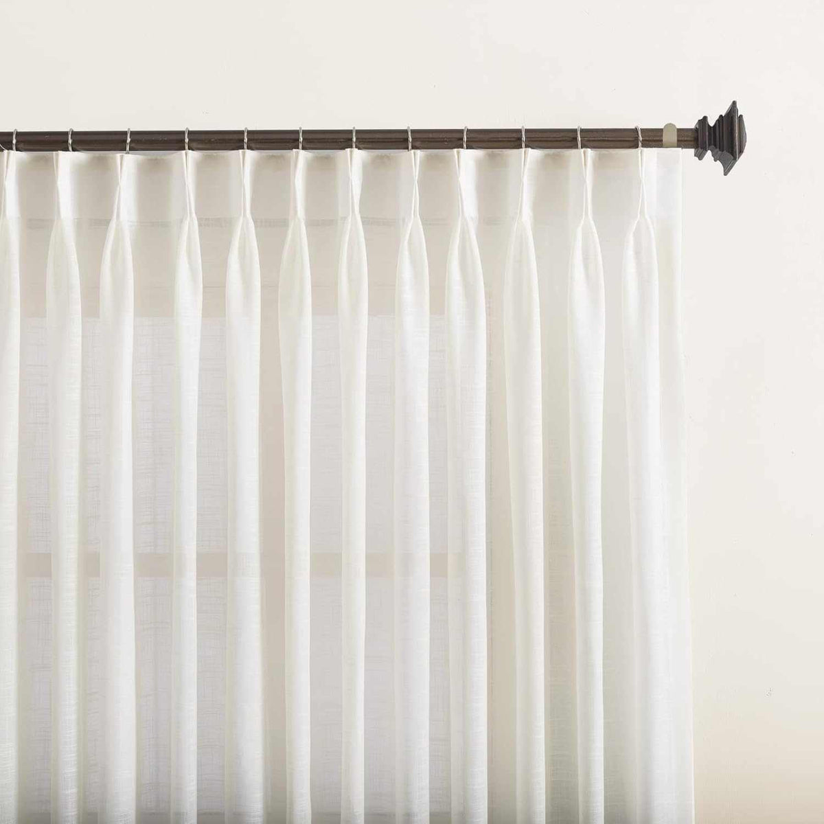 Set of 2 semi-sheer faux linen pinch pleat curtains with custom length, UV protection, and machine washable fabric