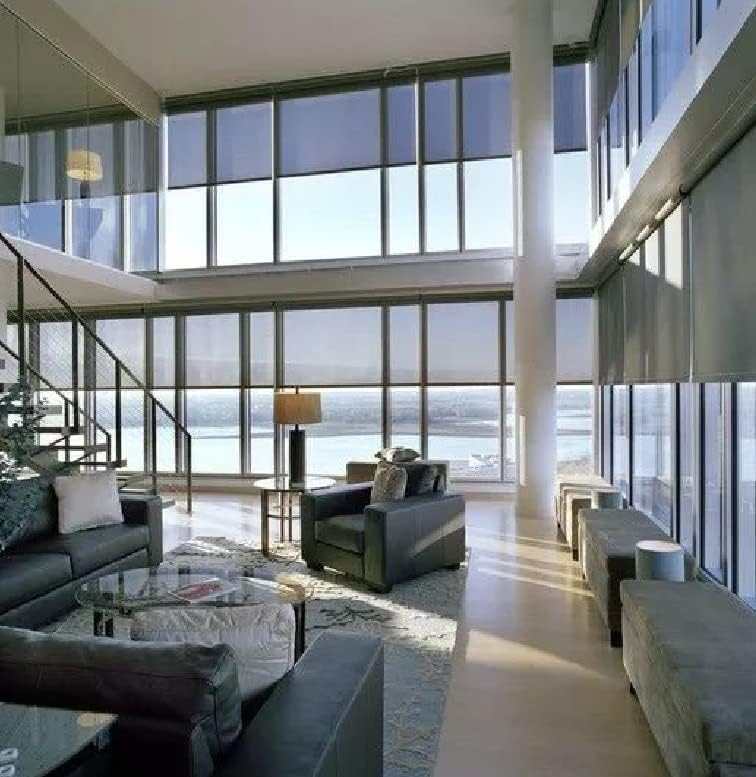 LANTIME solar cordless roller shade with light filtering, UV protection, and water resistance installed on window